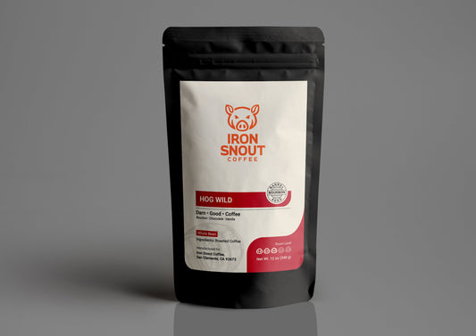The "Iron Snout Coffee" bag is black and white, showcasing a pig logo and the "Hog Wild" blend name on a gray background.